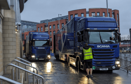 blue trucks parked outside of venue in nottingham